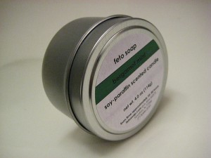 candle in silver tin